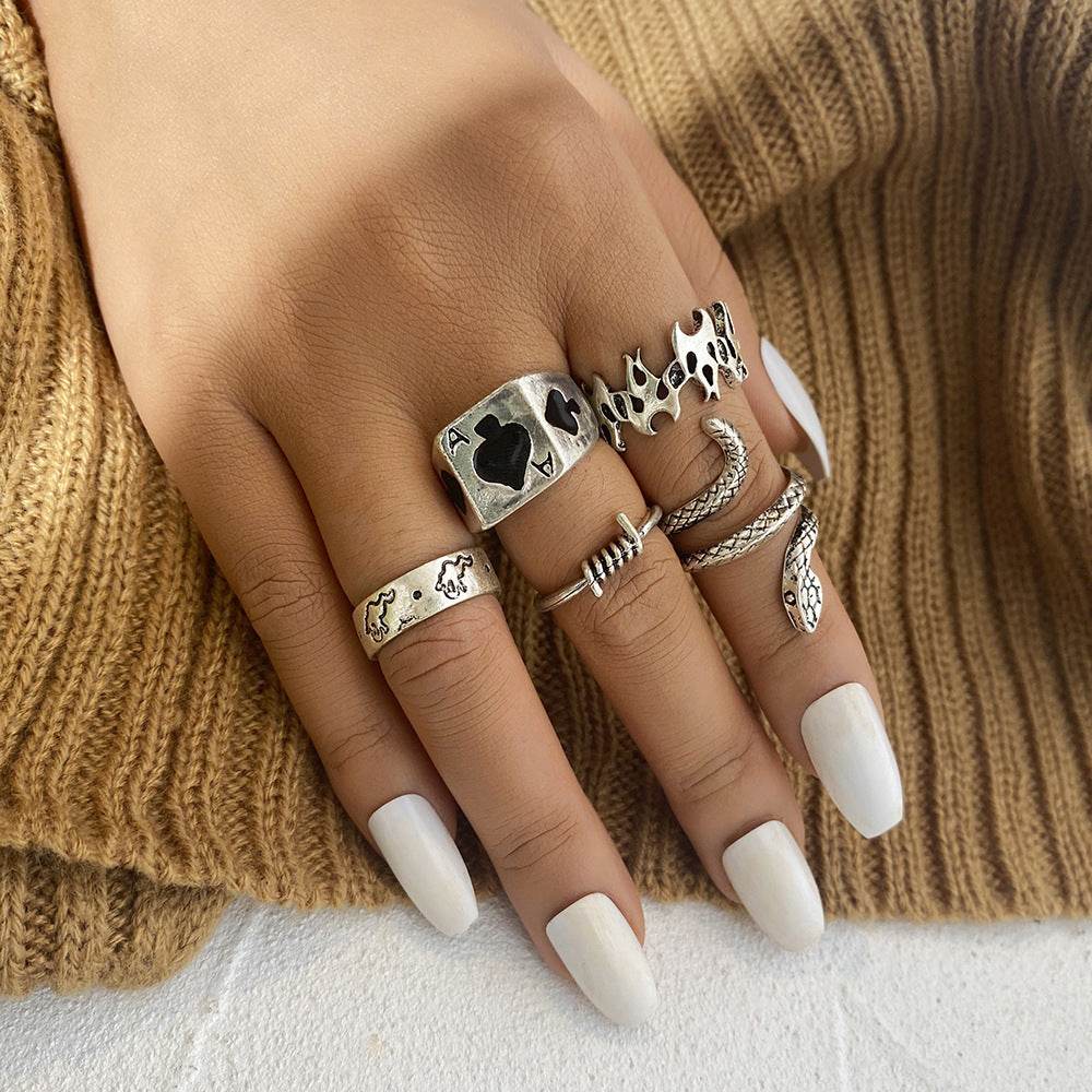 9-piece Set of Vintage Crying Face Rings, Playing Card Rings, Hollowed Out Love Rings, Daisy Rings, Alloy Chain Rings