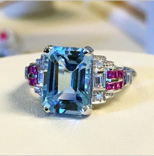 Topaz aquamarine ring inlaid red corundum ornament