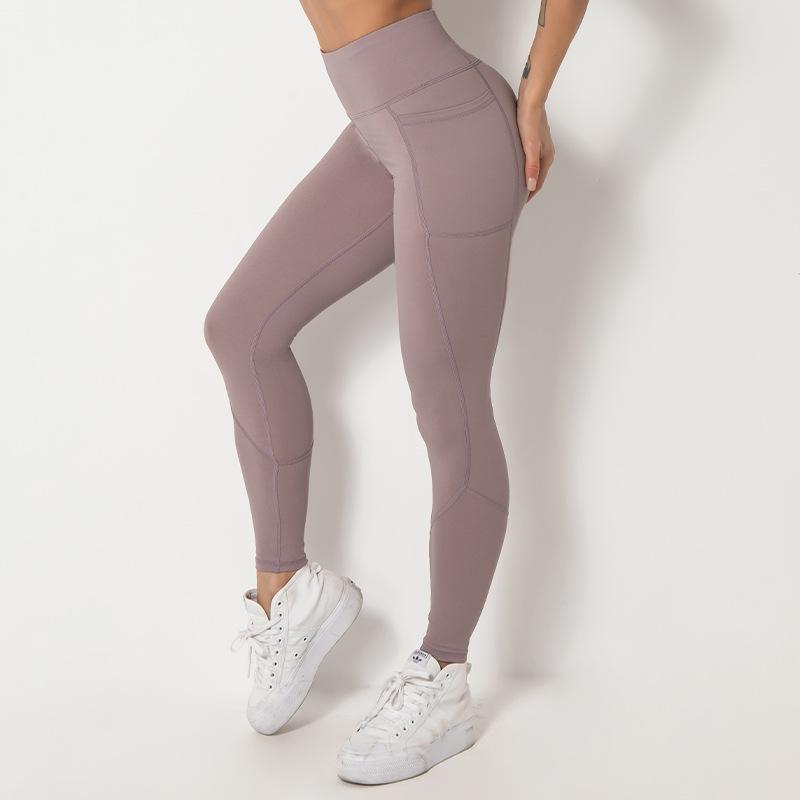 Spliced pocket size double-sided nylon high elastic sports high waist hip tight yoga pants women.